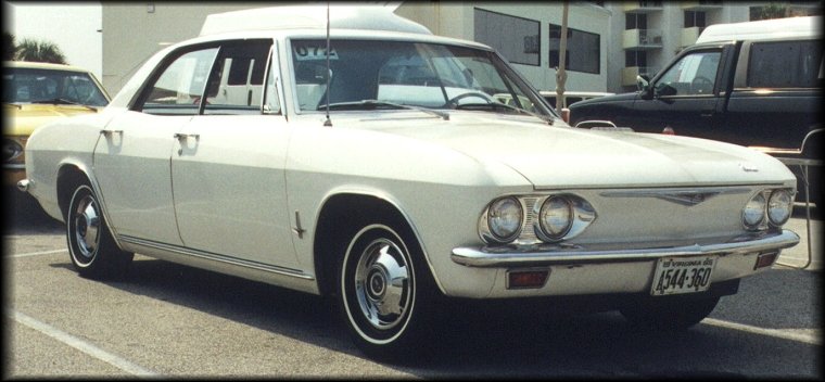 1965 Corvair Monza sport sedan (front 3/4 view)