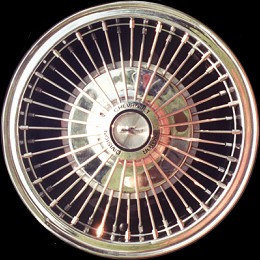 67-69 simulated wire wheel cover